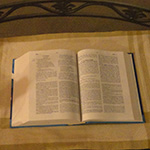 Bible with candles