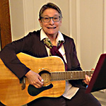 Sr. Maria playing guitar